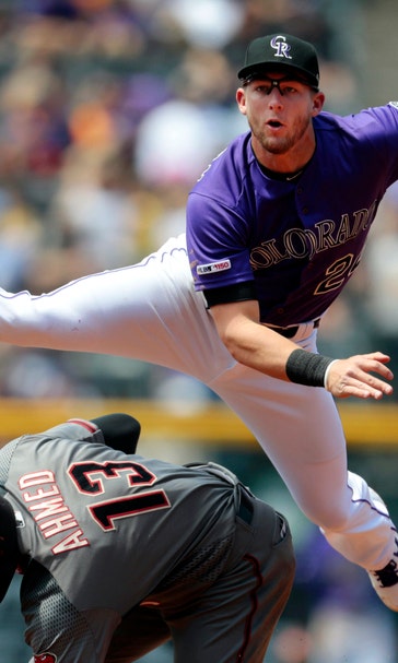 Murphy hits RBI single in 10th, Rockies beat Arizona 11-10